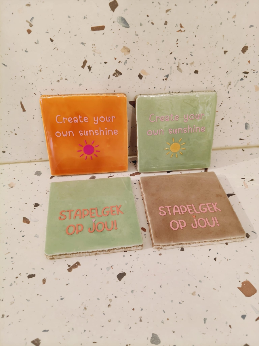Keramieken tegeltje: 'Create your own sunshine' oranje/warmroze